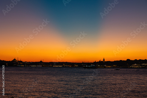 Istanbul Skyline. Anticrepuscular sunrays over the Istanbul at sunset