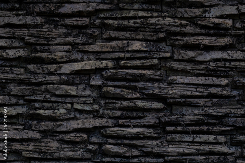 Dark Sandstone wall decoration for background and textured. Dark Sandstone wall decoration for background and textured.