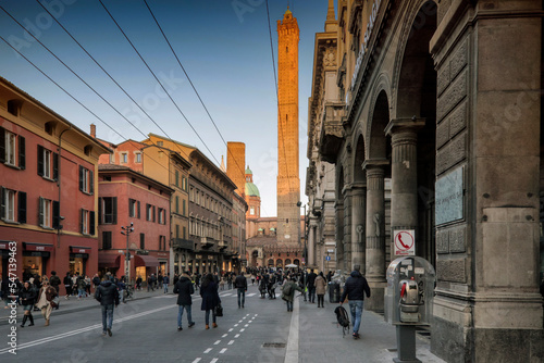 Bologna. Via Rizzoli con le Torri al tramonto photo