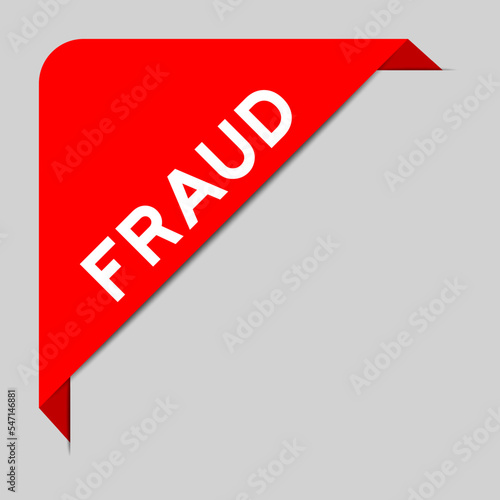 Red color of corner label banner with word fraud on gray background