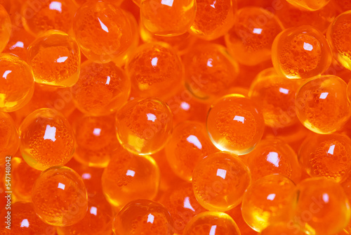 Macro photo of red caviar close up, salmon caviar background