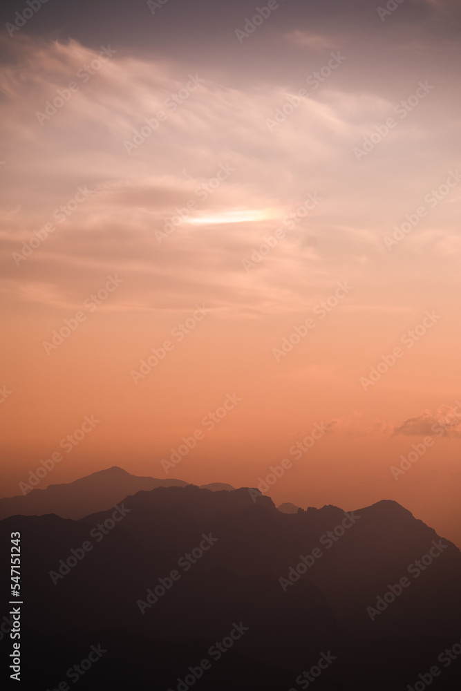 Light refractions at high altitude during sunset in the Orobie Alps, Northern Italy