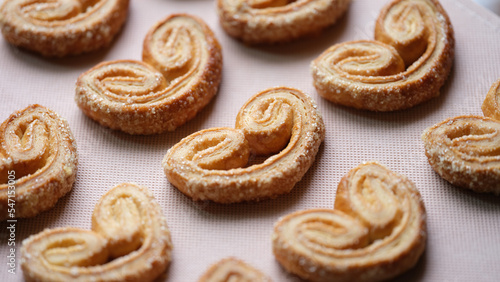 Wallpaper Mural Many heart-shaped cookies are laid out on tablecloth. Torontodigital.ca