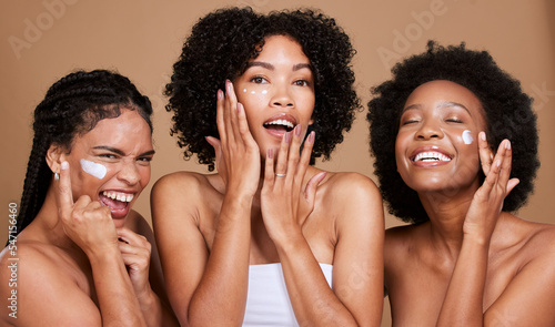 Photos Skincare, beauty and black women, friends and face cream in studio on brown background