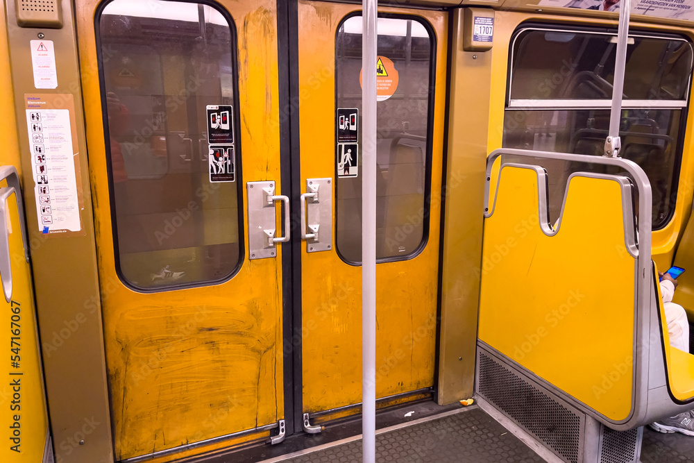 View of the inside of a subway train with the door closed in Brussels
