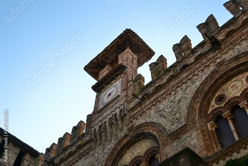 Horizontal image of the clock tower of the castle of Grazzano Visconti photo