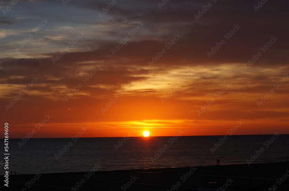 Photo of the sunset in Jurmala, Latvia. Evening at a sand beach.
