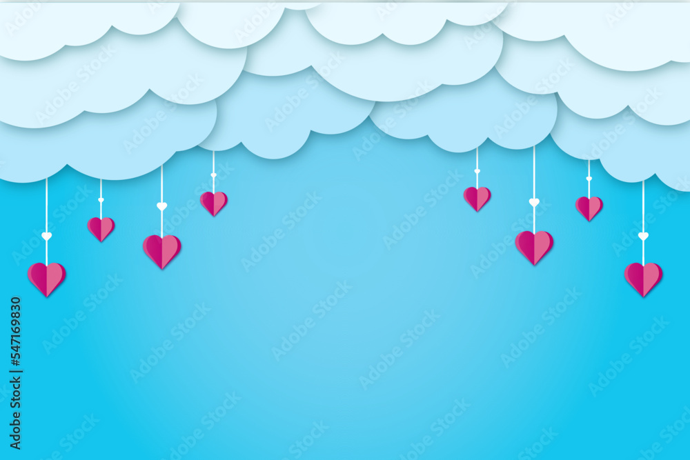 Blue sky with clouds and hanging paper cut hearts with copy space