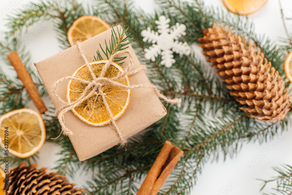 Gift box with natural Christmas decoration. New Year gift. Gift box with natural Christmas decoration. New Year gift.