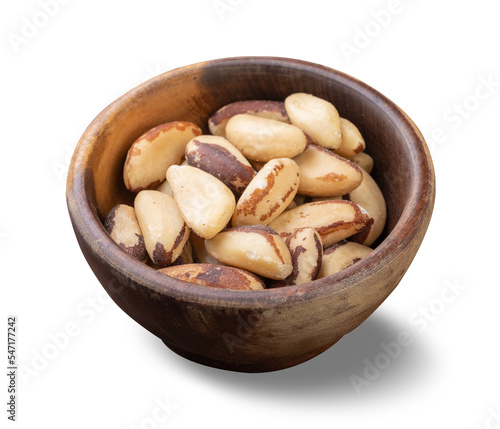 Brazil nuts on a bowl isolated over white background