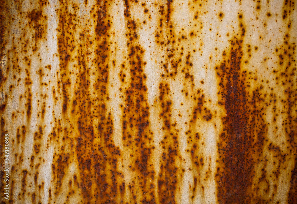 Texture of rusty iron, cracked paint on an old metal surface. Sheet of rusty metal with cracked and peeling paint, background for design with copy space. Texture of rusty iron, cracked paint on an old metal surface. Sheet of rusty metal with cracked and peeling paint, background for design with copy space.