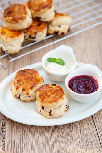 Cranberry scone set with raspberry jam and clotted cream