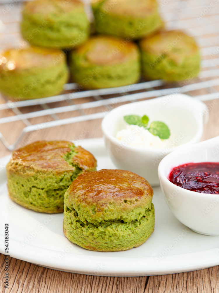 Green tea Matcha scone set with raspberry jam and clotted cream