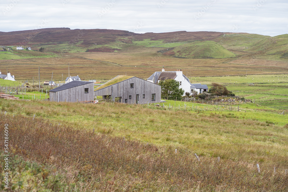 Countryside houses on hill with dry grass Countryside houses on hill with dry grass