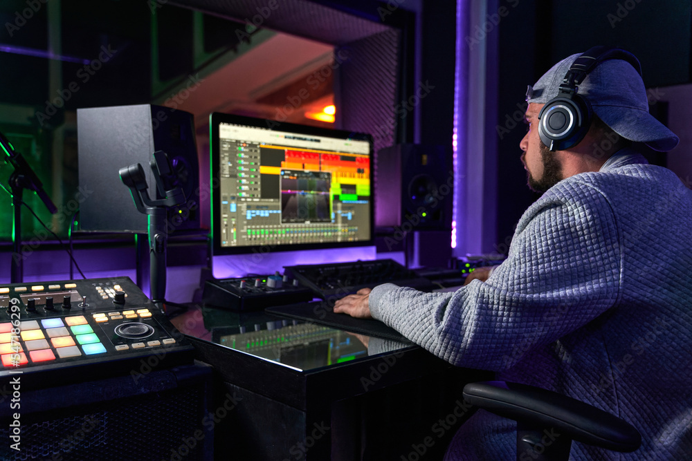 Music producer working in recording studio