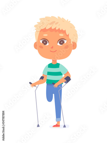 Cute boy on crutches after accident or injury, happy amputee child with amputated leg