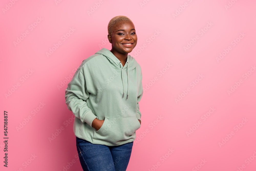 Photo of stunning woman wear cool street style fashionable khaki warm hoodie isolated on pink color background Photo of stunning woman wear cool street style fashionable khaki warm hoodie isolated on pink color background