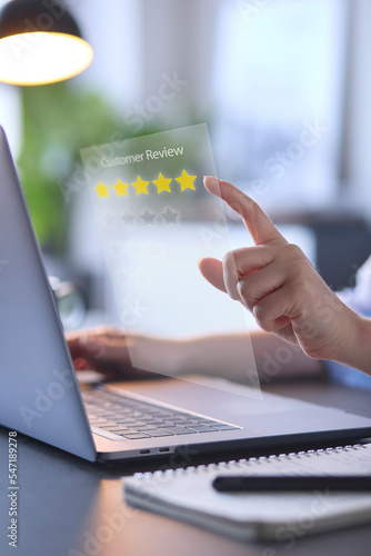 Photography Woman Using Laptop With Graphic Overlay To Leave Positive 5 Star Online Review