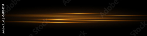 Golden light effect. Abstract laser beams of light. Chaotic neon rays of light.