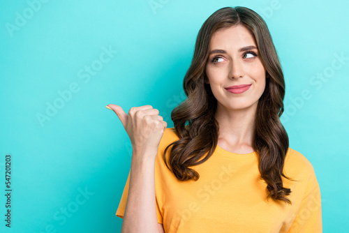 Photo of pretty cute lady stylish outfit arm direct index present empty space cool proposition sale shop isolated on cyan color background