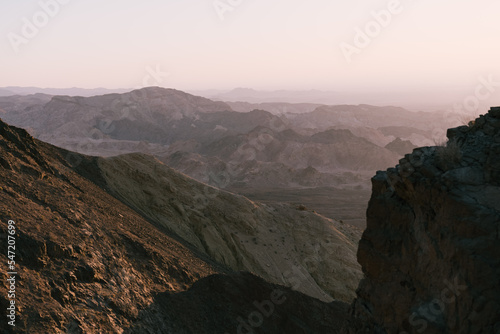 sunset over mountain valley in the desert