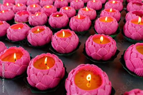 Burning candles in Buddhist temple, Malaysia photo