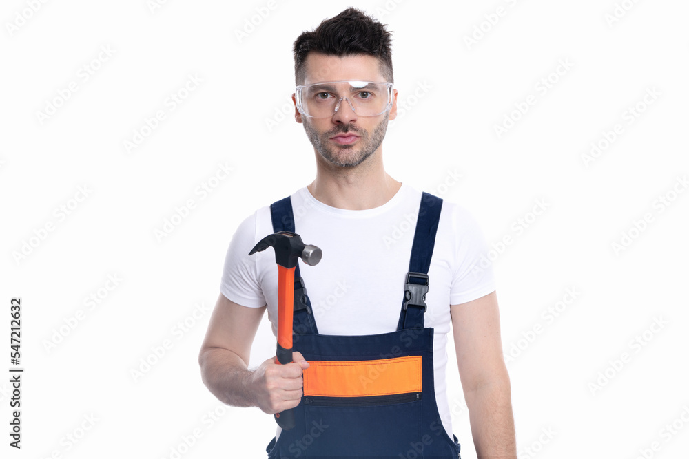 handyman with hammer in studio. positive handyman hold hammer isolated on white background handyman with hammer in studio. positive handyman hold hammer isolated on white background