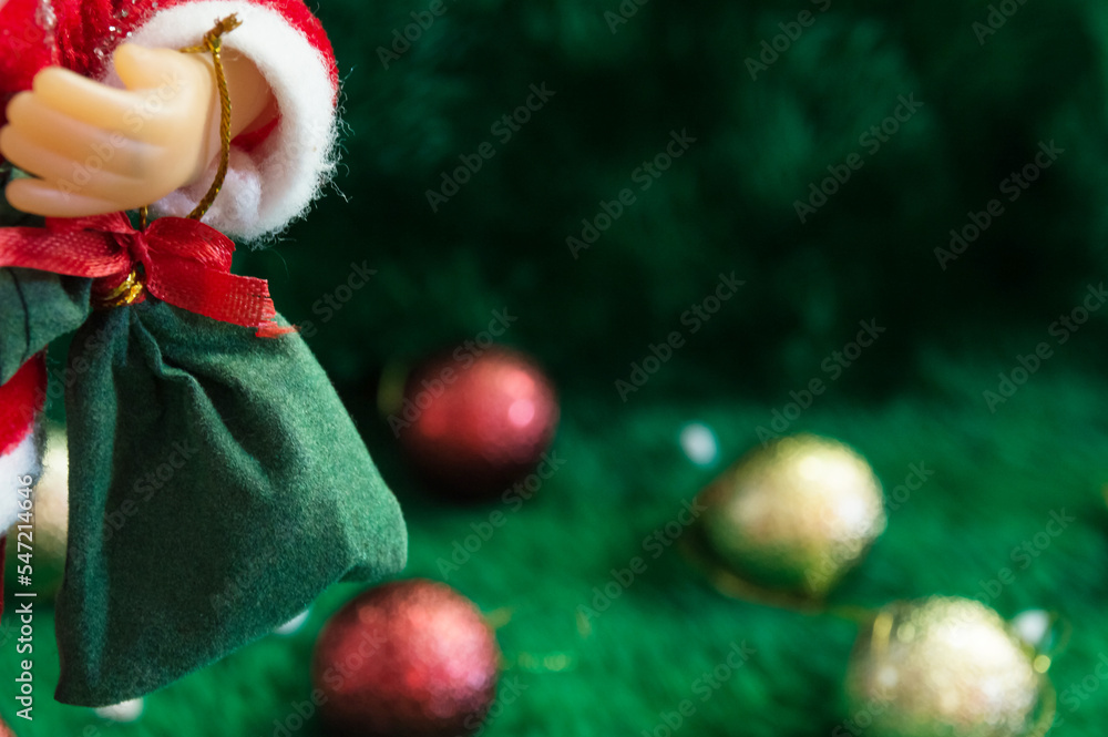 Obraz premium Image of a bag of toys in the foreground and blurred colored balls in the background