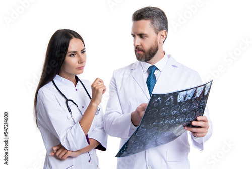 doctor neurologist look at xray isolated on white background. doctor neurologist hold brain xray