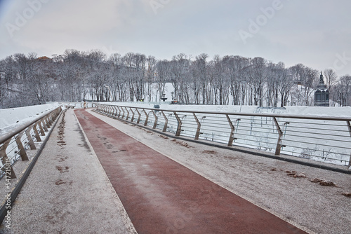 Pedestrian bridge in Kiev in snowy weather. © Ryzhkov Oleksandr