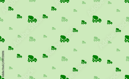Seamless pattern of large and small green concrete mixer truck symbols. The elements are arranged in a wavy. Vector illustration on light green background