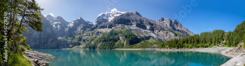 The Oeschinensee lake and the peaks Doldenhorn, Frundenhorn, Oeschinenhorn, Blumlisalphorn Wyssi Frau and Morgenhorn in Bernese alps. © Renáta Sedmáková