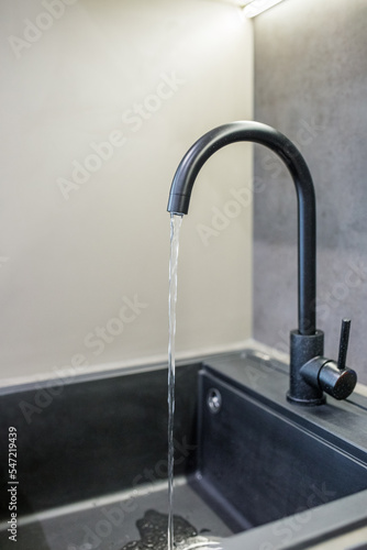 Kitchen faucet for water. Water faucet in kitchen.