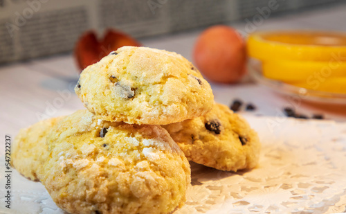 Homemade orange crinkle cookies with powdered sugar icing and chocolate 