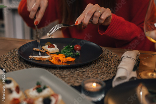 Close up view of cutting food on a plate