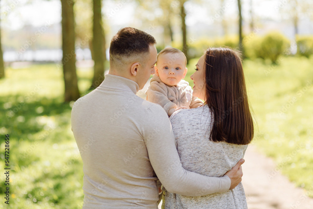 Family Enjoying Walk In Park