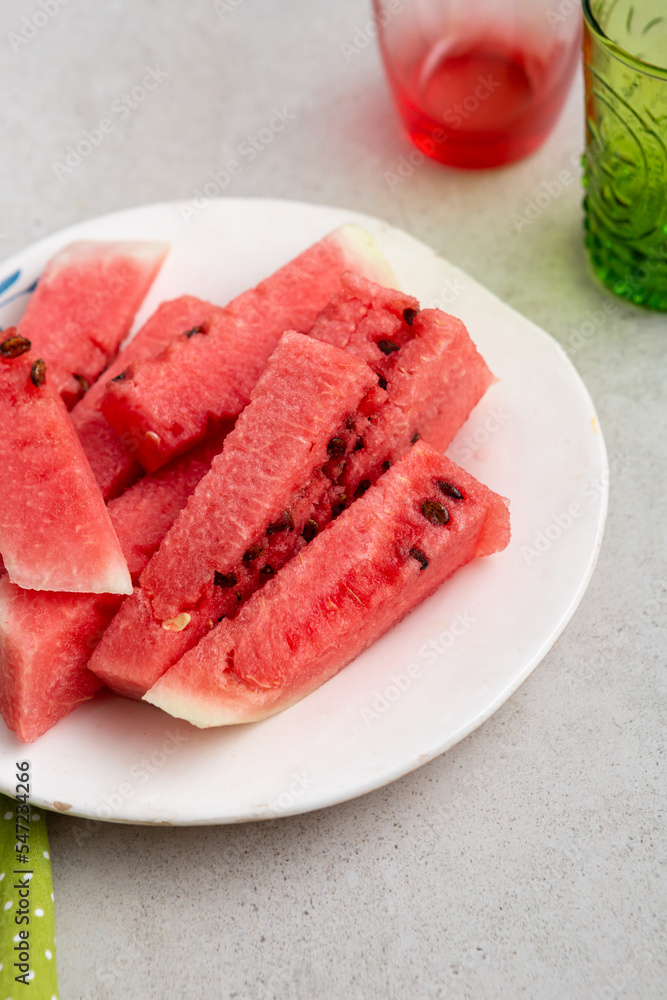 Close up of sliced watermelon on plate summer Close up of sliced watermelon on plate summer