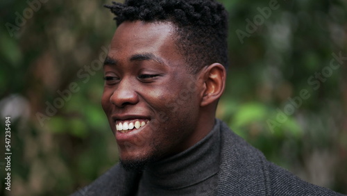 Friendly happy black African man portrait close-up smiling