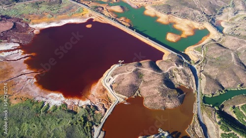 Aerial drone view of Mining activity. Apocalypse scenery. Earth destruction. Disruption of nature.  Extracting natural resources from the Earth to sell on the world market. Ecological disaster.
