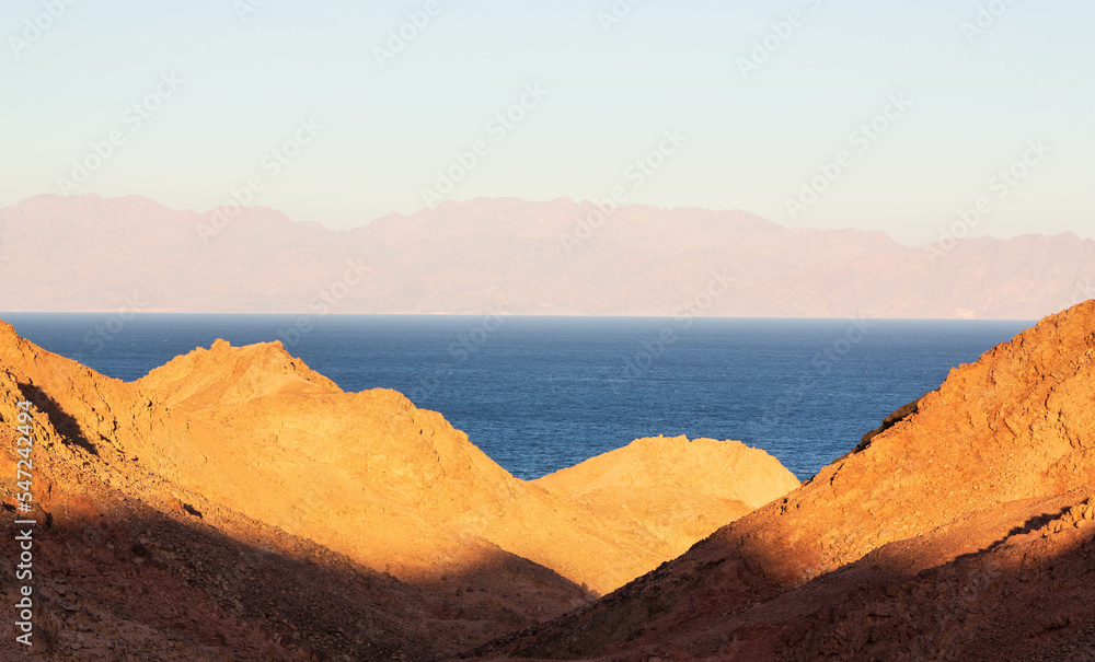 Φωτογραφία Aerial view of Sinai mountains, Red Sea and the coast of Saudi Arabia at sunset