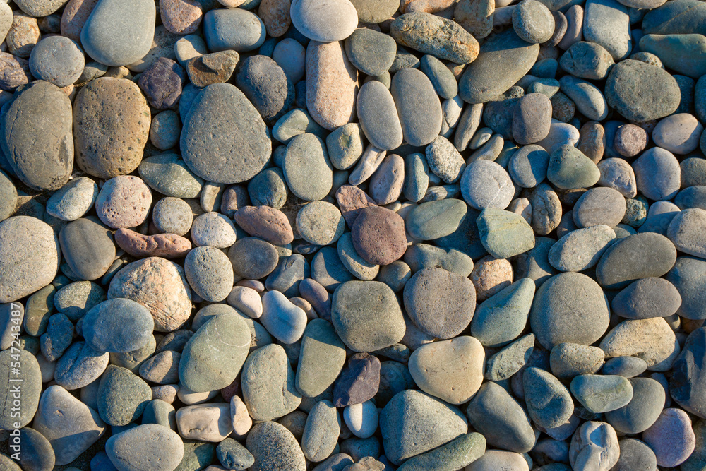 Close up of rounded and polished beach rocks Close up of rounded and polished beach rocks