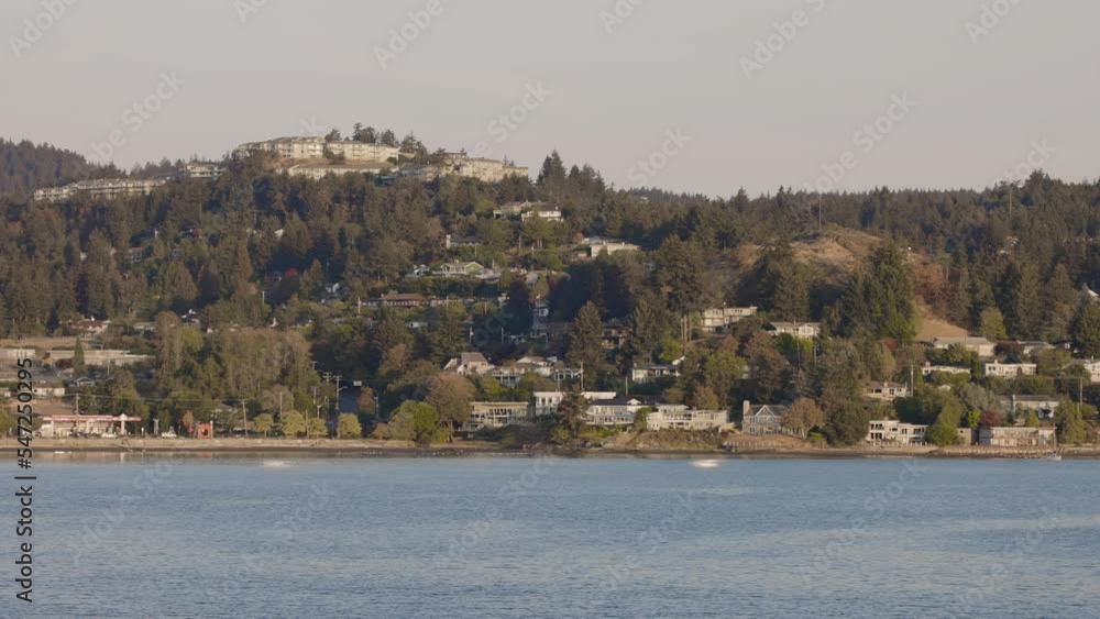 City by the water surrounded by Homes, mountains and trees. Fall Season. Nanaimo, Vancouver Island, British Columbia, Canada. City Background. Slow Motion Cinematic City by the water surrounded by Homes, mountains and trees. Fall Season. Nanaimo, Vancouver Island, British Columbia, Canada. City Background. Slow Motion Cinematic