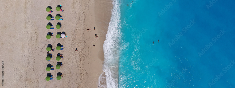 Aerial drone ultra wide panoramic top down photo of famous paradise bay and beach of Kathisma with deep turquoise sea in island of Lefkada, Ionian, Greece Aerial drone ultra wide panoramic top down photo of famous paradise bay and beach of Kathisma with deep turquoise sea in island of Lefkada, Ionian, Greece
