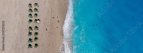 Aerial drone ultra wide panoramic top down photo of famous paradise bay and beach of Kathisma with deep turquoise sea in island of Lefkada, Ionian, Greece