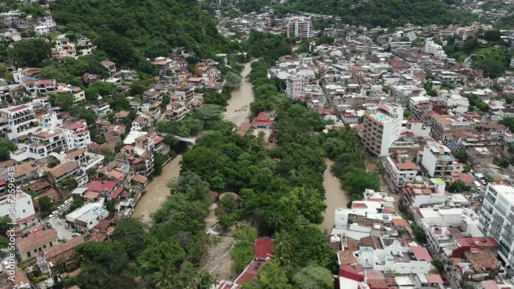 Aerial View of the Cuale River Flooded by Hurricane Nora Aerial View of the Cuale River Flooded by Hurricane Nora