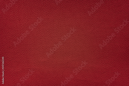 Close up carmine red color leather texture.