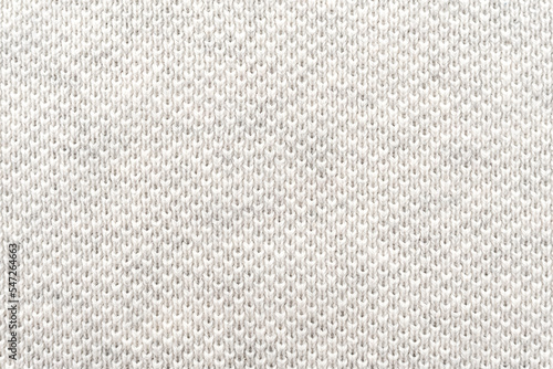 White natural texture of knitted wool textile material background. White crochet cotton fabric woven canvas texture. close up