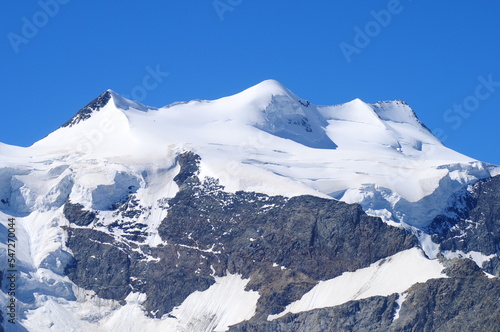 Switzerland: The mountain peaks and glaciers of the Bernina massiv in the swiss alps photo