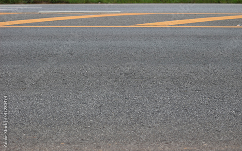 Asphalt road with yellow line