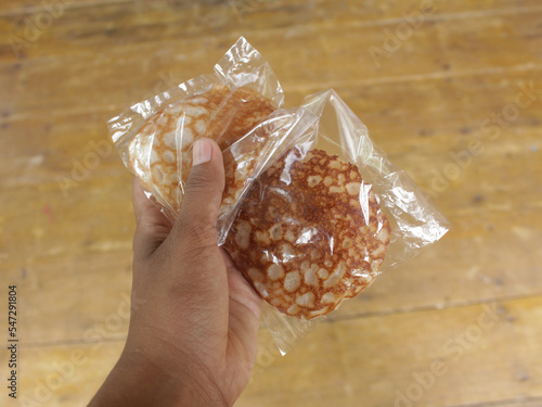 Serabi, a typical Indonesian pancake made from rice flour and coconut milk. Serabi is one of the roadside snacks and a favorite menu during the month of Ramadan photo